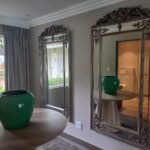 large wall mirror installation Johannesburg living room